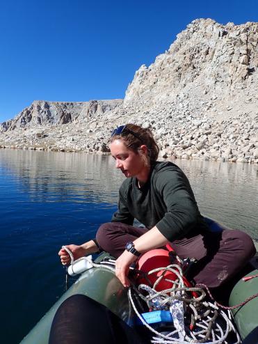 Adrianne Smits, a NSF postdoctoral fellow at UC Davis, deploys a mooring in a Yosemite lake. (E. Suenaga)