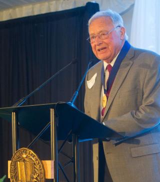Hess accepts the UC Davis Medal.