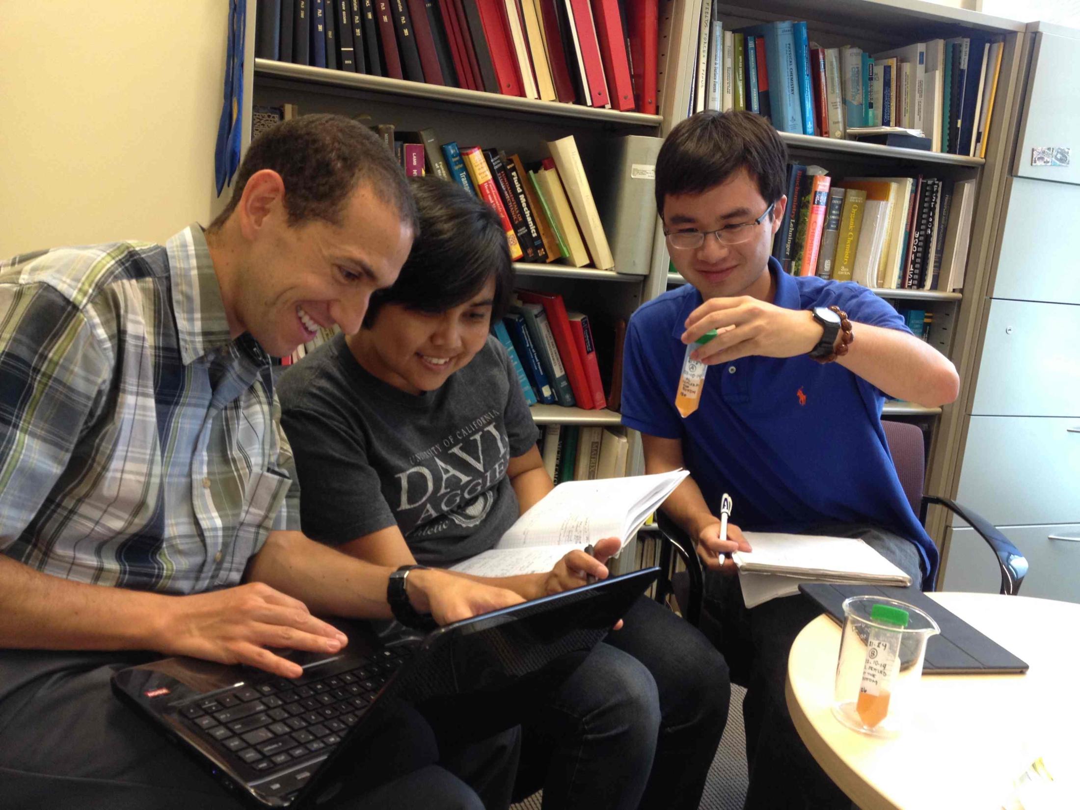 (L-R) Researchers Antonio Garay, Irnayuli Sitepu and Kevin Xu tested surfactant (detergent) activity of glycolipids produced by strains of yeast from the UC Davis Phaff Yeast Culture Collection. Photo by: Kyria Boundy-Mills, UC Davis 
