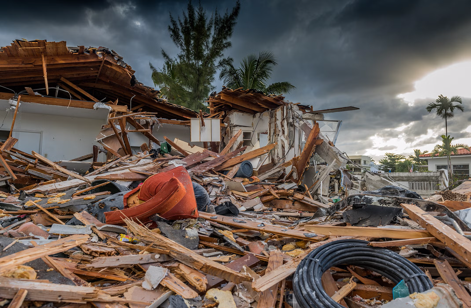 From natural disasters to impacts on irreplaceable natural systems like coral reefs, the social cost of carbon quantifies the damage a ton of carbon dioxide has on society and the economy. (Both images: Getty) 