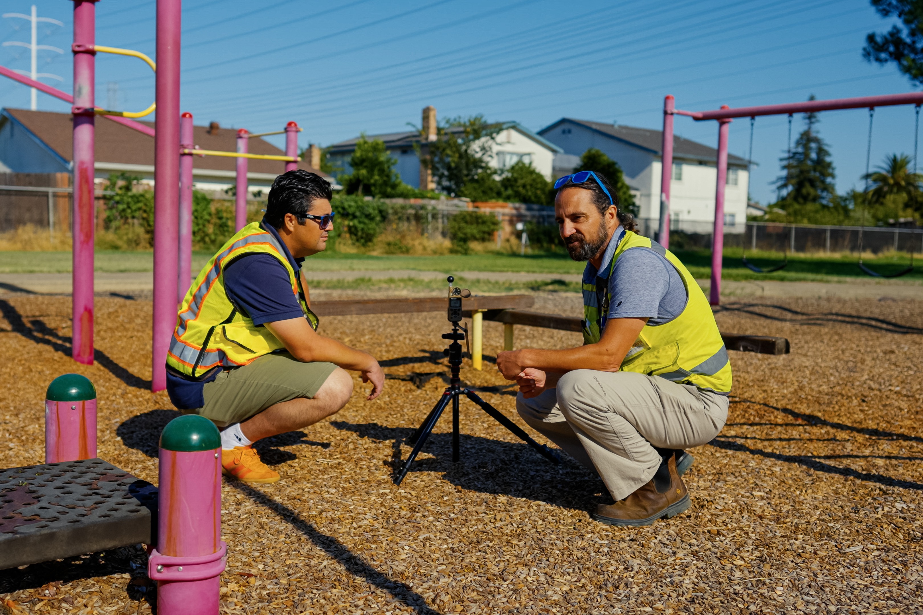 A student and profeessor in a school playground