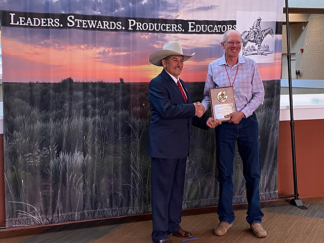 The Society for Range Management presented Tate an award for exceptional accomplishments and contributions to the art and science of range management through rangeland stewardship in 2022. (Courtesy Leslie Roche)