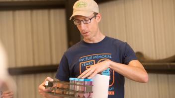 Teaching assistant Mark Felice discusses soil carbon testing during a soil science class at Russell Ranch. (Gregory Urquiaga/UC Davis)
