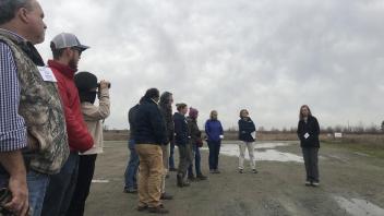 Martha Ozonoff ’91, M.S. ’98 and Heidi Satter of the Yolo Basin Foundation describe the multiple uses of the land in the bypass including flood management, agriculture, wildlife habitat and public education.