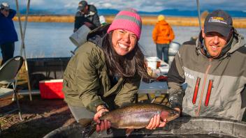 Undergrads can work with faculty on research projects, such as tagging trout near Fall River. (Photo by Val Atkinson)