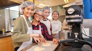 Student baking in a Food Science class.