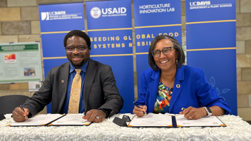 At Global Ag Food Systems Day, Dean Helene Dillard signed an agreement of cooperation with the International Livestock Research Institute to develop basic scientific and technological research and education for students at both institutions. (UC Davis)