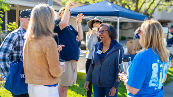 Dean Helene Dillard laughs with visitors at her "Donuts with the Dean" event. (Jael Mackendorf/UC Davis)