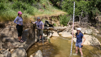 Students from the "Water Science and Management" class use different tools and methods to learn more about the water cycle during a field trip to Stebbins Cold Water Reserve.