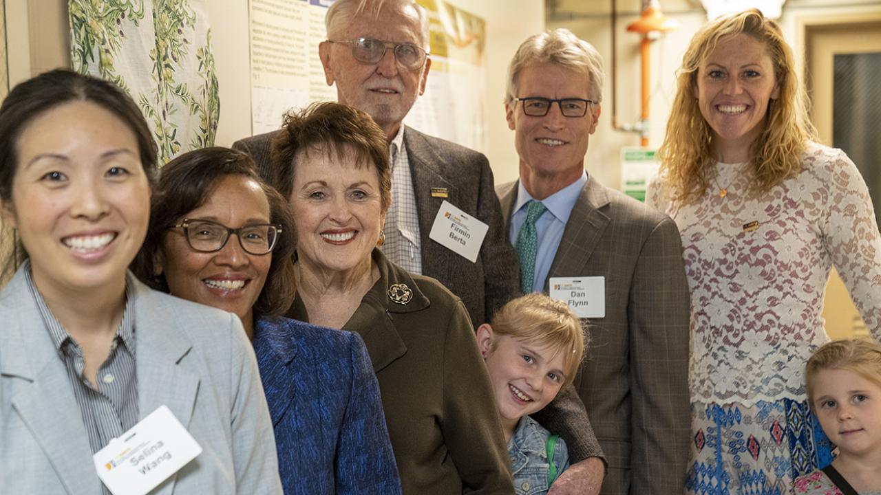 The Berta family, Olive Center staff and Dean Helene Dillard celebrate the dedication of a renovated lab in the Sprocket Building on November 15. (Photo by John Stumbos) The Berta family, Olive Center staff and Dean Helene Dillard celebrate the dedication of a renovated lab in the Sprocket Building on November 15.