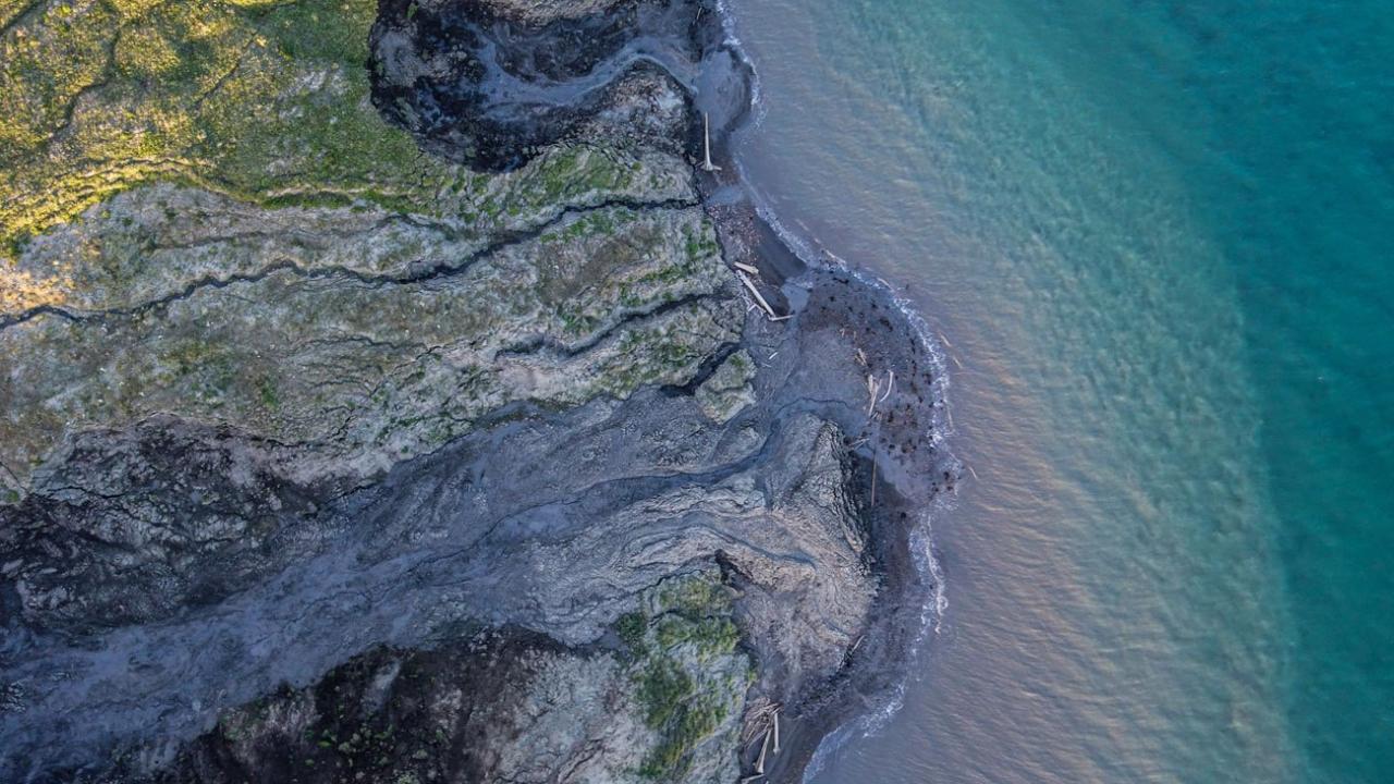 A drone-captured image of a permafrost thaw slump on Qikiqtaruk-Herschel Island in the Canadian Arctic. (Jeffrey Kerby/National Geographic Society) A drone-captured image of a permafrost thaw slump on Qikiqtaruk-Herschel Island in the Canadian Arctic. (Jeffrey Kerby/National Geographic Society)