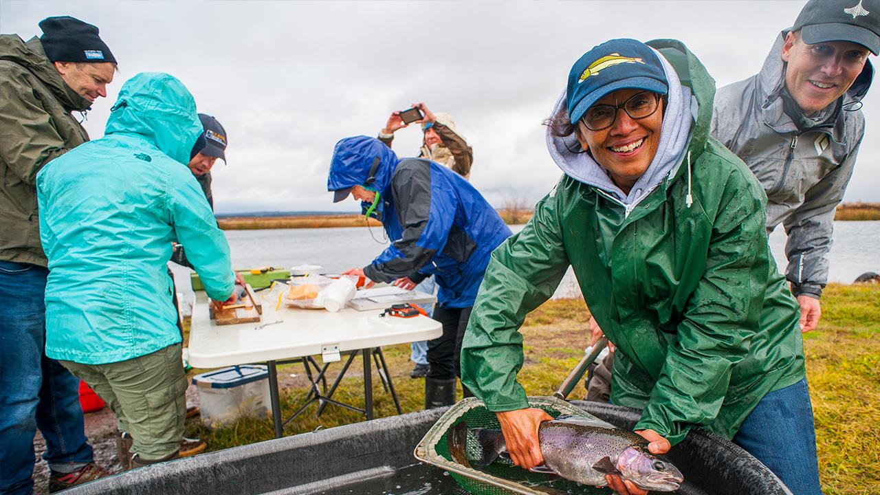 Dean Dillard holds a fish.