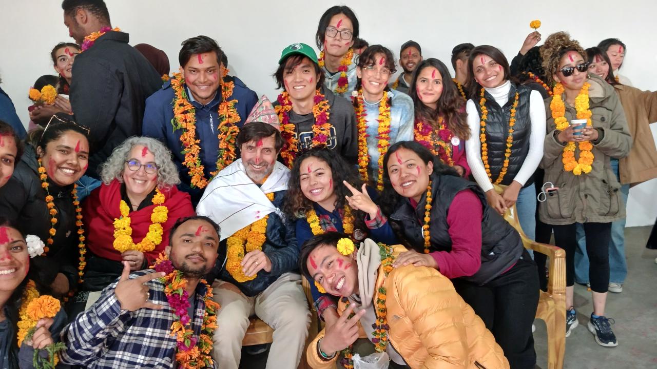 Professors Nancy Erbstein and Jonathan London surrounded by students in Nepal. Photo by: Jonathan London, UC Davis