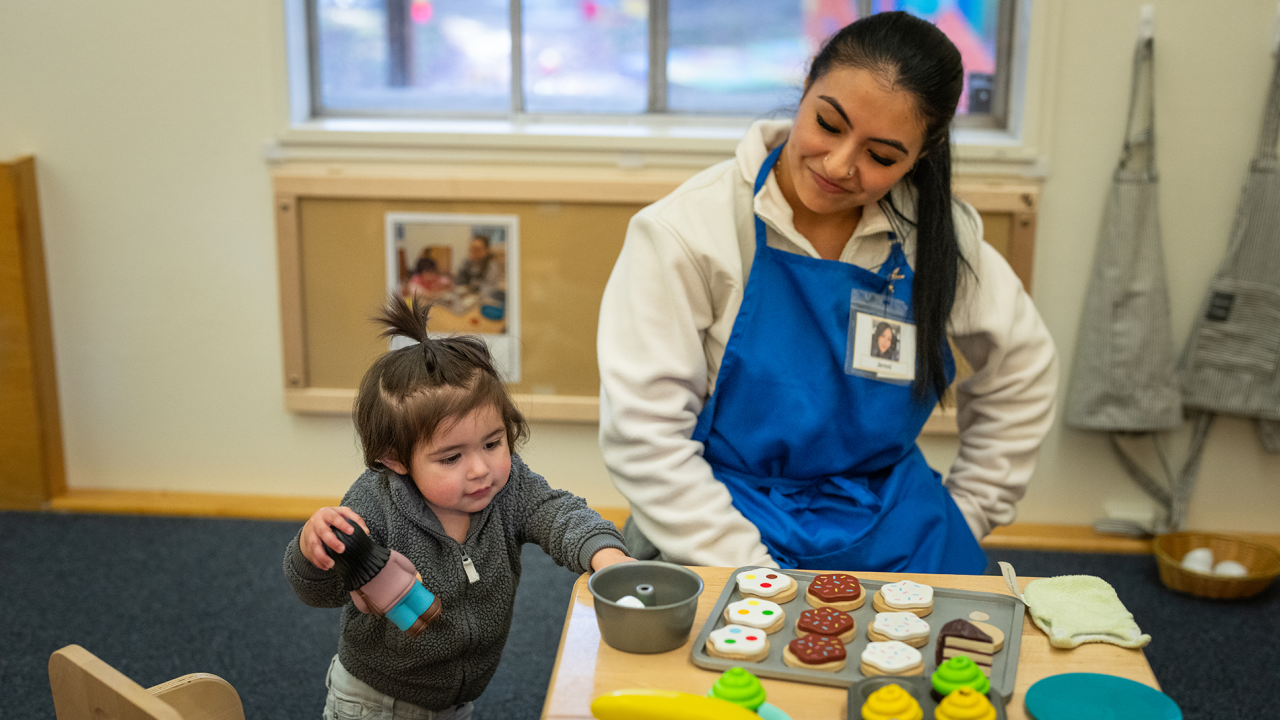 UC Davis student Jennifer Sanchez-Malagon with a child at the Early Childhood Lab School. Photo by: Jael Mackendorf, UC Davis.