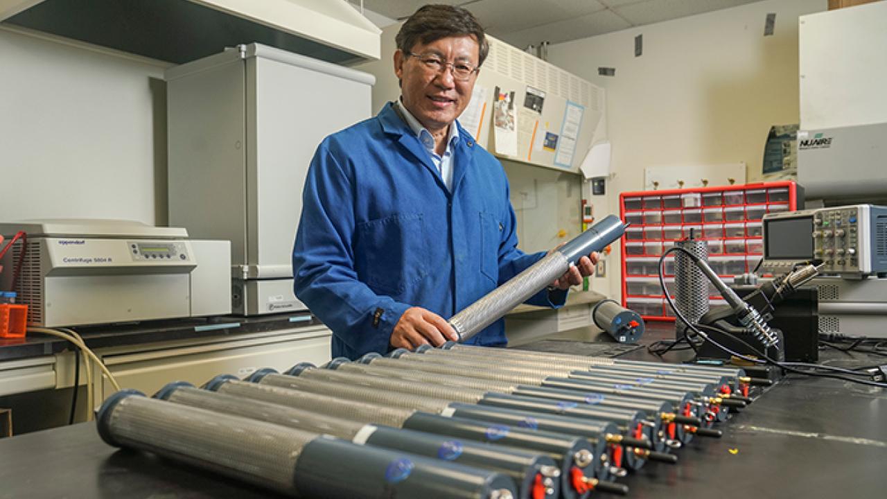 Professor Zhongli Pan and his team developed a novel device called SmartProbe to monitor and predict insect occurrences in agricultural products. (Karin Higgins/UC Davis)