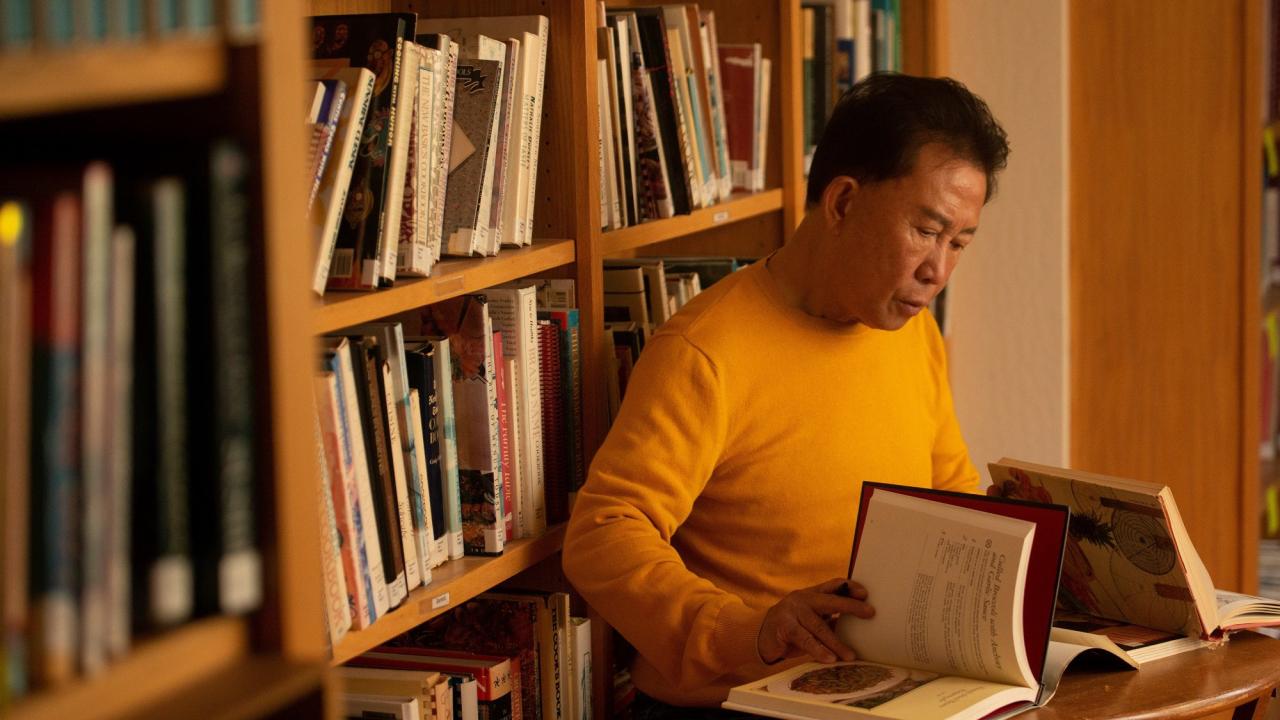 Over the course of his career, Martin Yan collected cookbooks from around the world to reference when conducting research to develop new recipes. Nearly 3,000 cookbooks from Yan’s extensive collection will become part of the Chef Martin Yan Legacy Archive at the UC Davis Library. (Gregory Urquiaga/UC Davis)