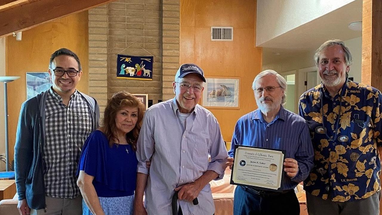 Professor Emeritus Jim Seiber (center) with son Chuck and wife Rita on his left and environmental toxicology chair Robert Rice and CA&ES executive associate dean Ron Tjeerdema on his right.