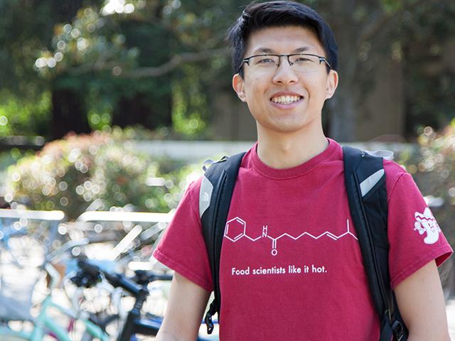 Student standing outside.