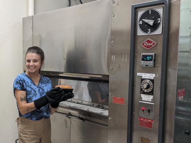 Maria Rottersman baking bread using seed varieties developed without alpha-gliadin proteins. (Alejandra Andrade / California Wheat Commission) 