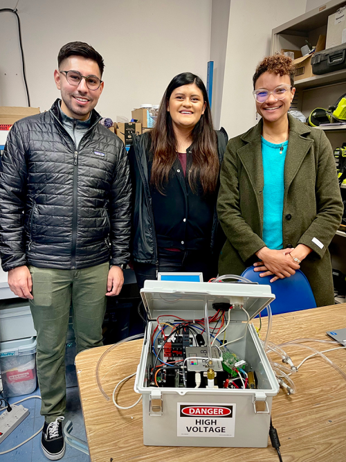 UC Davis graduate students Alejandro “Alex” Sanchez, Brenda Lopez Reyna and Michaela Anang are part of the Community Air Quality Project that is collaborating with communities to use novel, low-cost air quality monitors to measure hazardous air pollutants. Photo by: Tiffany Dobbyn, UC Davis