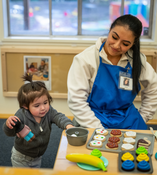 UC Davis student Jennifer Sanchez-Malagon with a child at the Early Childhood Lab School. Photo by: Jael Mackendorf, UC Davis.