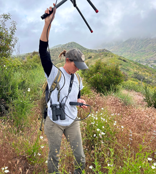 Ellie Bolas, a PhD Candidate at UC Davis, uses radio telemetry to locate research animals in Santa Monica Mountains National Recreation Area. © National Park Service