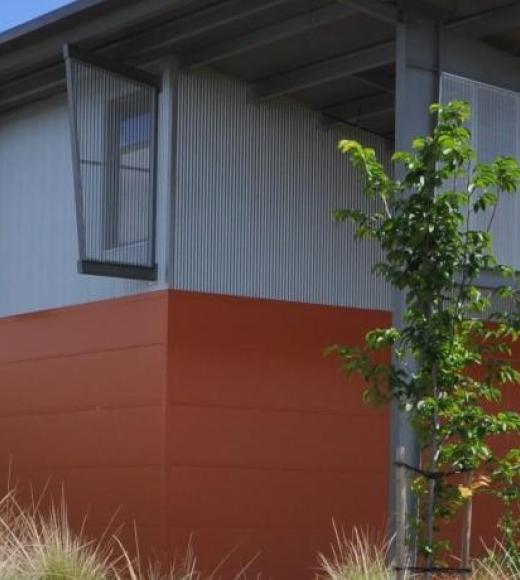 The outside of a modern building on the UC Davis campus.