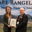 Grace Woodmansee (left), UC Davis graduate student, receives national leadership award from Professor Clayton Marlow, Montana State University, and president of the Society for Range Management