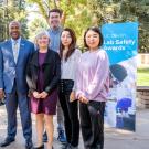Chancellor Gary May and CA&ES Associate Dean Patsy Eubanks Owens (center) join Linda Harris and her team to celebrate their award.