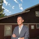 Ben Houlton, director of the John Muir Institute of the Environment, stands outside The Barn, a renovated cattle barn at UC Davis that houses the administrative offices for the JMIE and several other programs. (Karin Higgins/UC Davis)