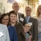 The Berta family, Olive Center staff and Dean Helene Dillard celebrate the dedication of a renovated lab in the Sprocket Building on November 15.