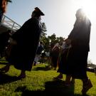 Students walking into the ARC Pavilion for the commencement ceremony.