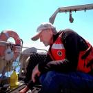 Steven Morgan, professor of UC Davis Department of Environmental Science and the UC Davis Bodega Marine Laboratory, prepares to deploy yellow &quot;robot larvae&quot; off the coast of Bodega Bay, California. Photo: Joe Proudman/UC Davis
