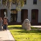 Prospective students and their parents take a walking tour of campus on February 7, 2022. The tour visits an Egghead outside Mrak Hall.
