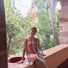 Andra sitting on a bench outside