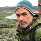 UC Davis polar ecologist Eric Post at his long-term field site in Arctic Greenland with his daughter in the background. (Eric Post/UC Davis)