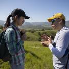 Professor Sam Sandoval Solis explains a point about the watershed to Kyra Gu, junior studying the environmental science management major.