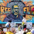 UC Davis alumna Greta McLain joined with Xena Goldman and Cadex Herrera to paint this mural at the intersection where George Floyd died. (Courtesy Lorie Shaull)