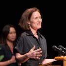 Human ecology professor Leigh Ann Simmons addresses Wisdom of Women symposium after winning the inaugural Women & Philantrhopy Impact Award Sunday (Oct. 16). (José Luis Villegas)