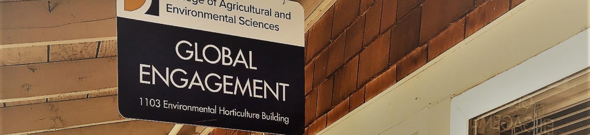 Global Engagement sign hangs from the ceiling.