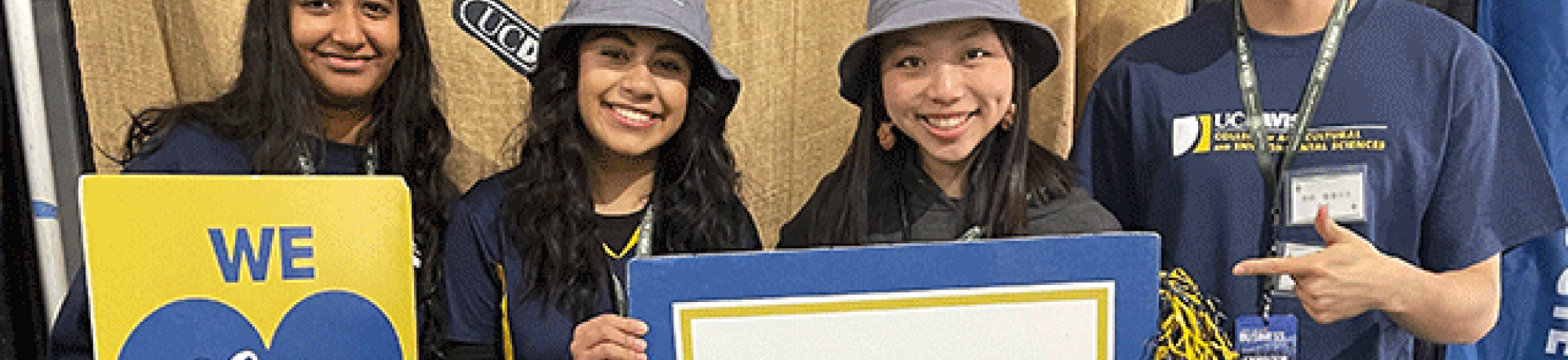 Students at the CA&ES booth in Tulare, CA during World Ag Expo.